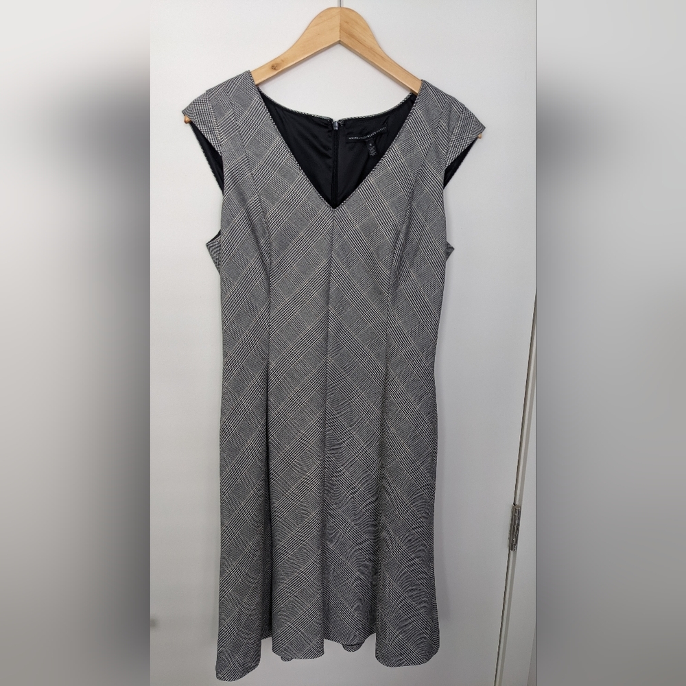 Cap sleeve houndstooth print dress. A line, zip back, fully lined.